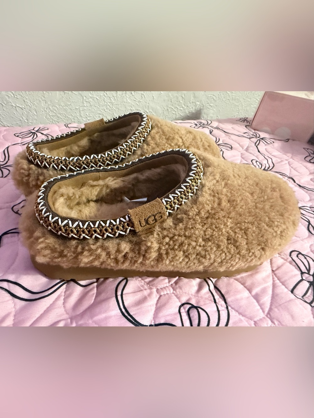UGG women’s Slip-On Shearling Slippers in Tan